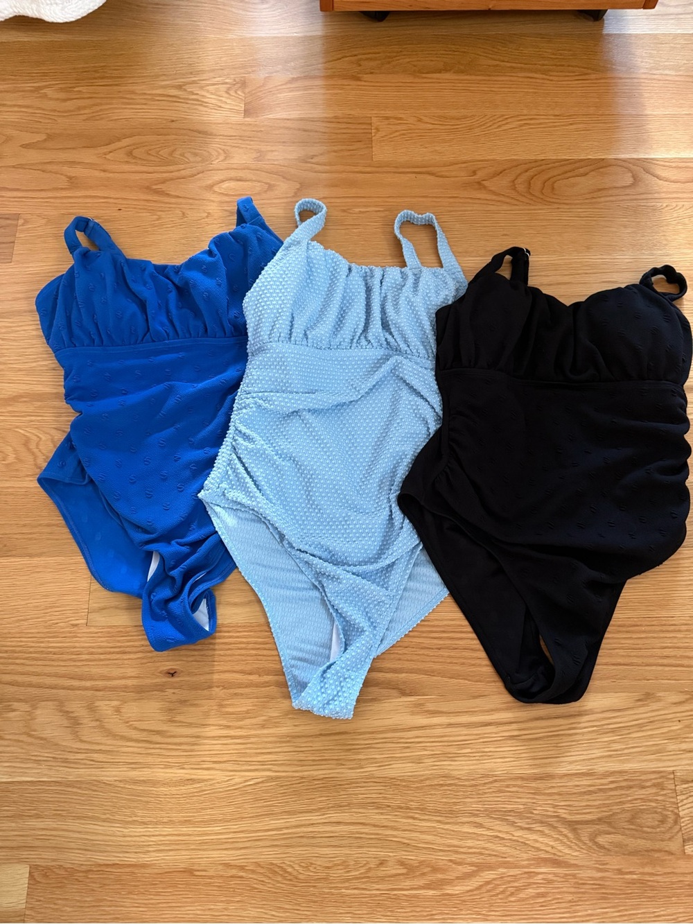 3 One-Piece Swimsuits in Royal Blue, Light Blue, and Black